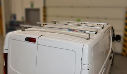 05_Barres porte-tout avec profil Ultrasilent© sur toit de Fiat Talento