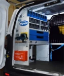 Atelier à bord du Courier Ford aménagé par Syncro pour chauffagiste
