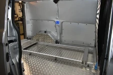 Glissière Syncro System pour transport cercueils sur fourgon